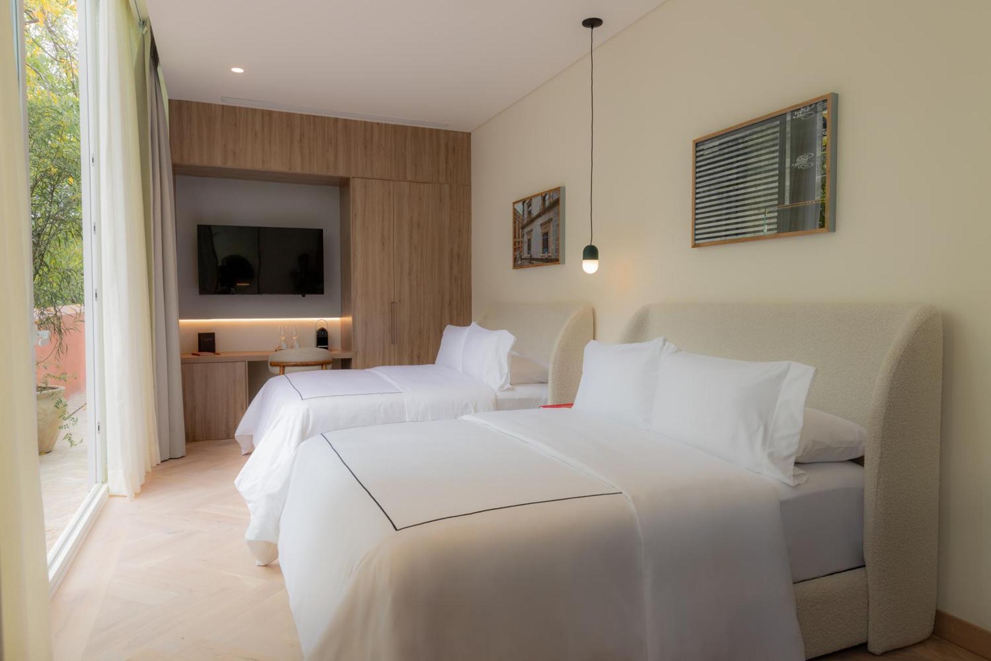 Habitación Doble con balcón - 2 camas